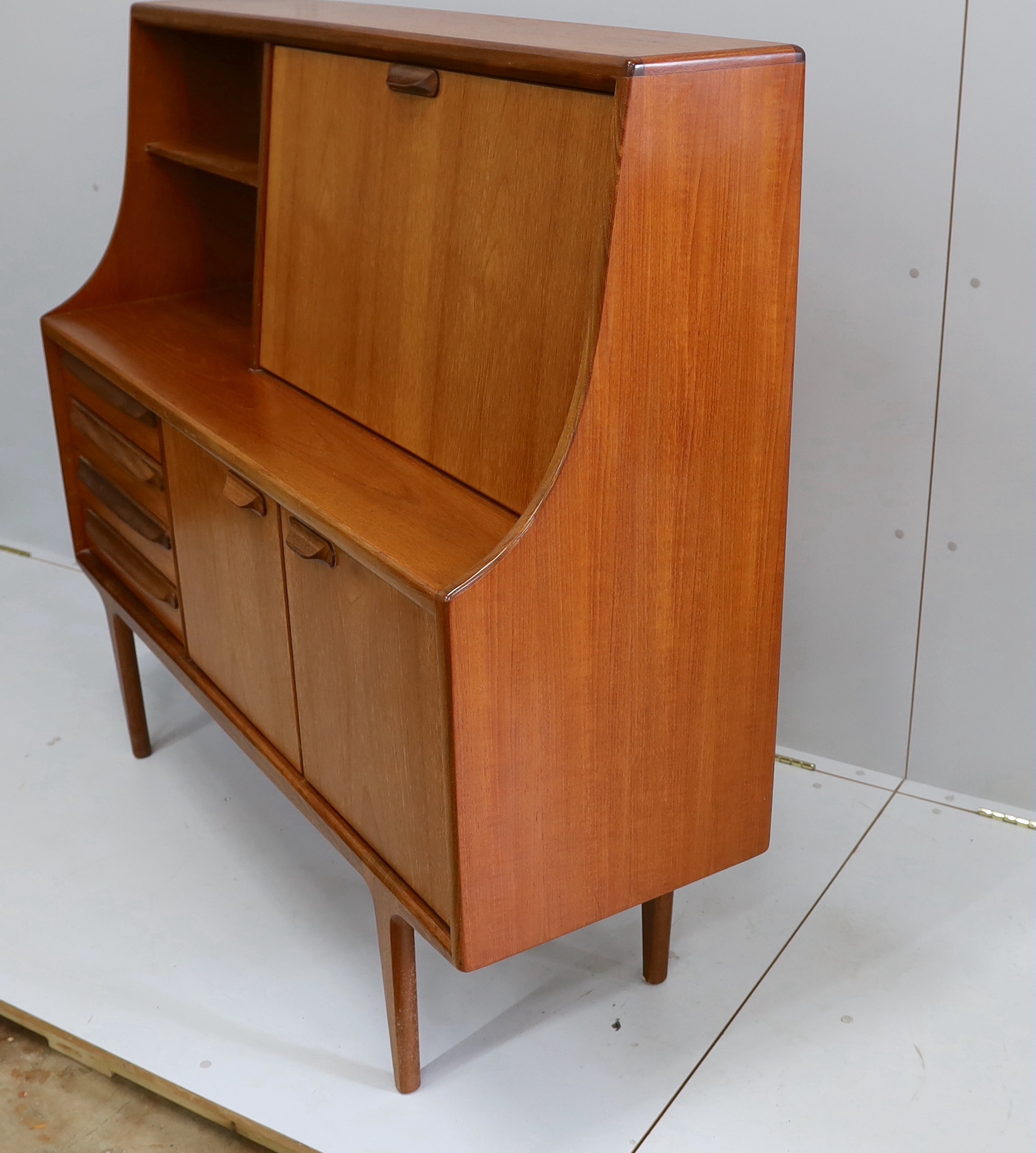 John Herbert for Younger Furniture - A teak high sideboard, width 145cm, depth 46cm, height 130cm